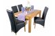 Extending Solid Oak Table And Black Chairs