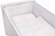 The Cot Bed Protector in White and Powder Pink